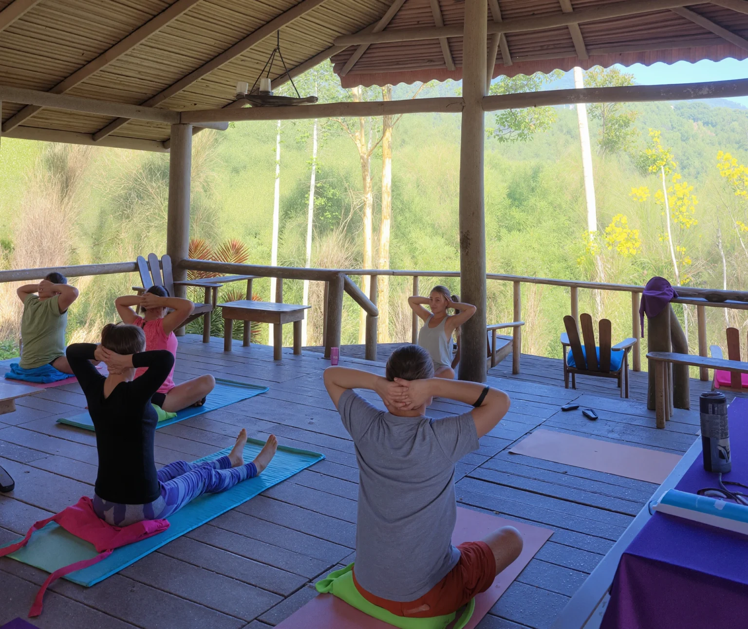 Yoga class at Pacuare River Ecolodge, people practicing outdoors.