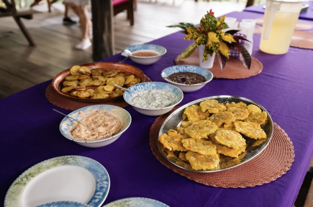 Pacuare River Ecolodge dining table with plantains and dips.