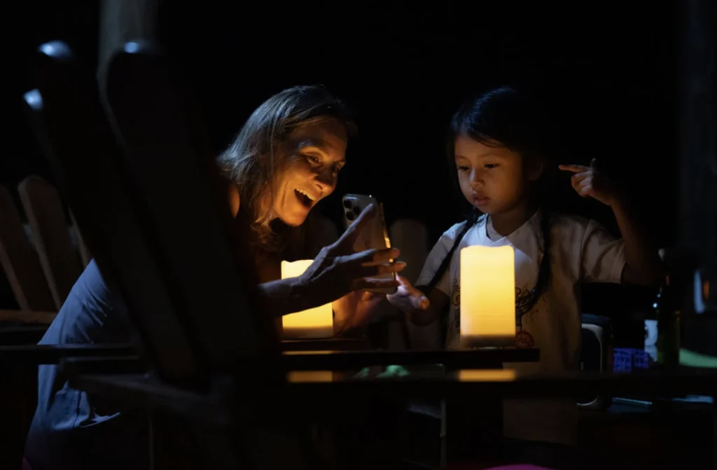 Pacuare River Ecolodge guests enjoying candlelit evening
