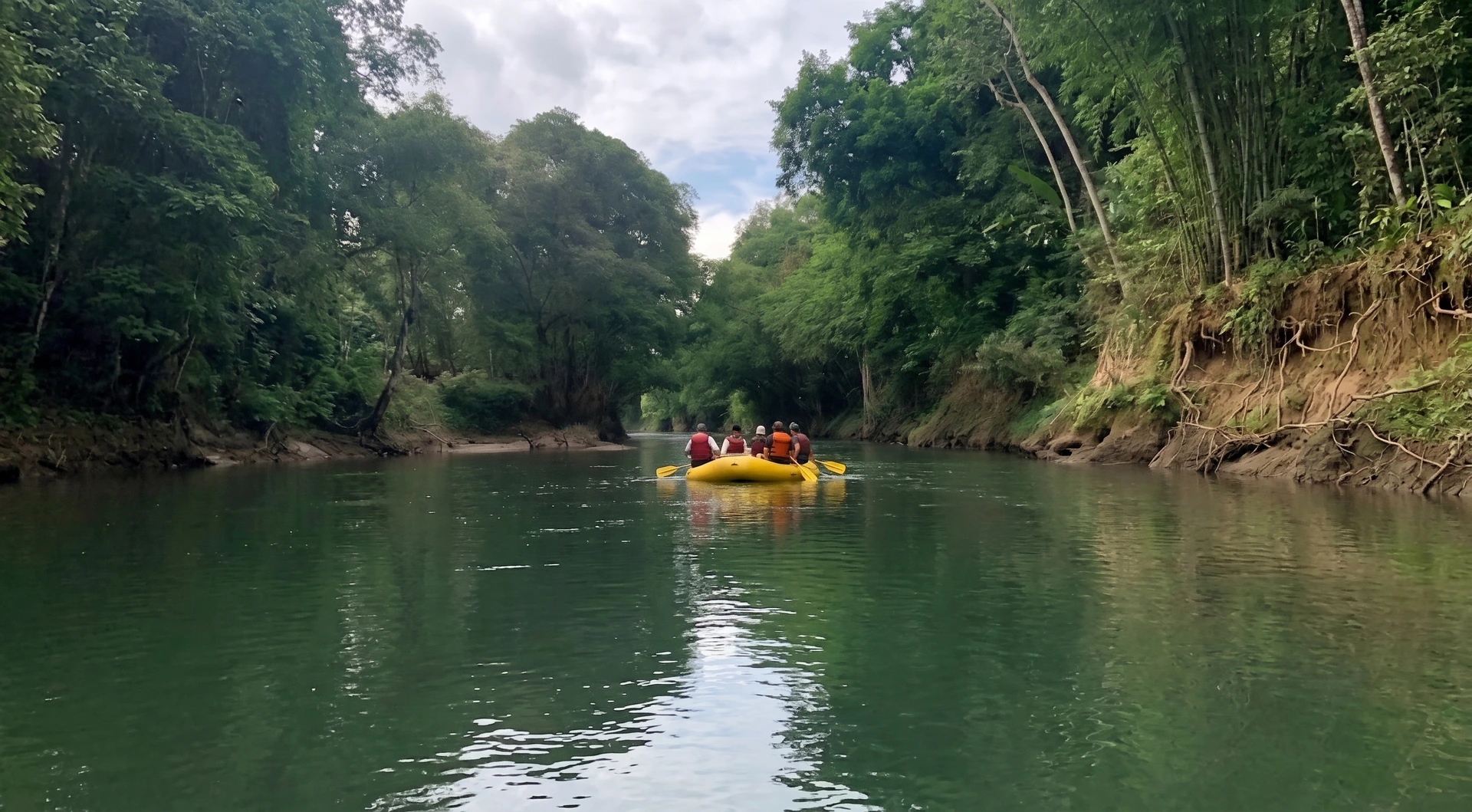 rafting on Pacuare River surrounded by lush green forest